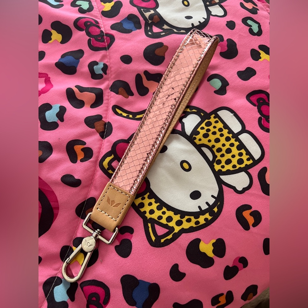 Consuela Pink and Tan Wristlet strap